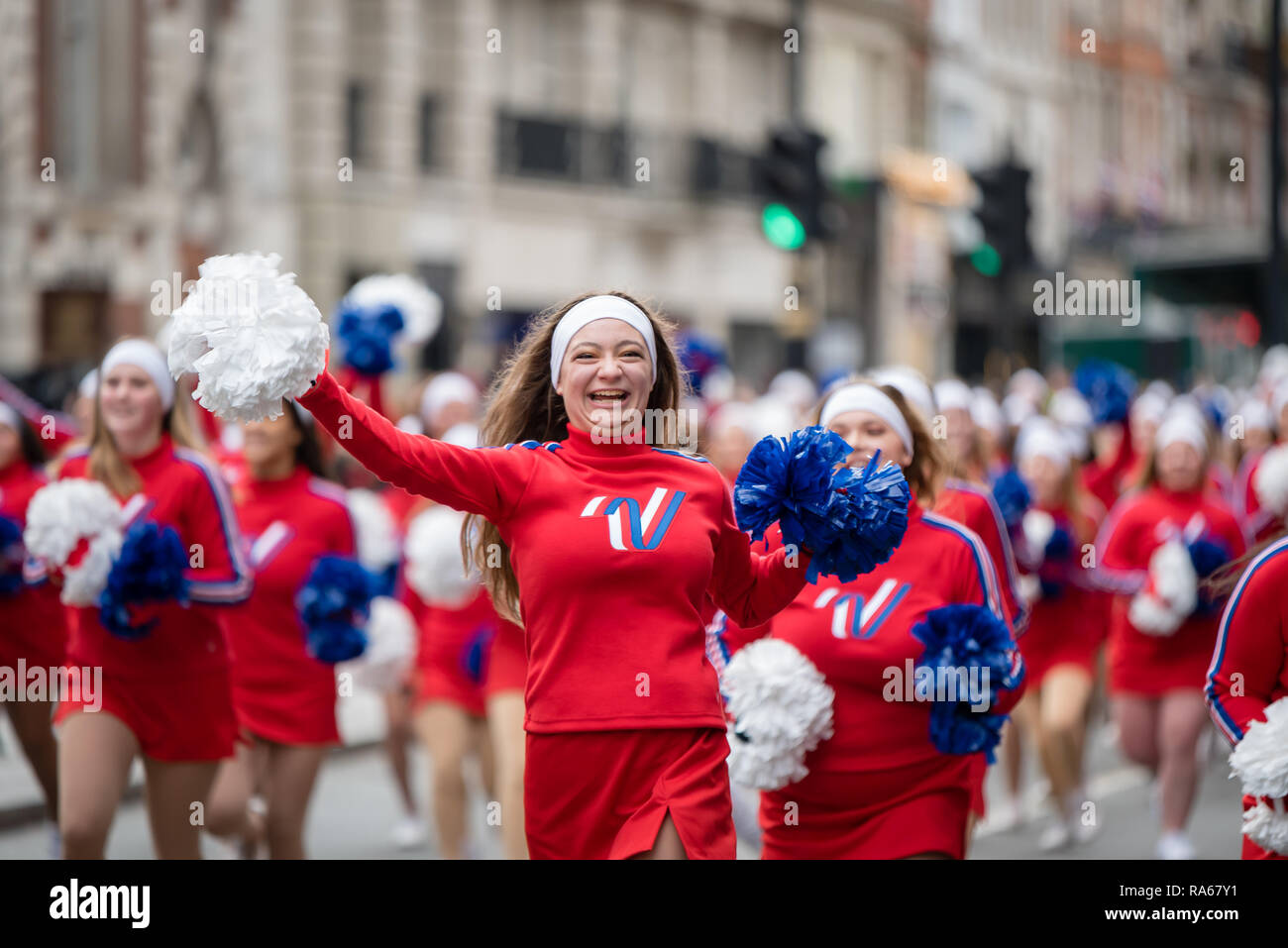 London, UK.  1 January 2019.   The theme of the parade this year was “London Welcomes the World”. With thousands of performers from a multitude of different countries and cultures from all around the world parade through central  London. Acts included Varsity Spirit All-American Universal & National Cheerleaders Association.  Credit: Ilyas Ayub / Alamy Live News Stock Photo