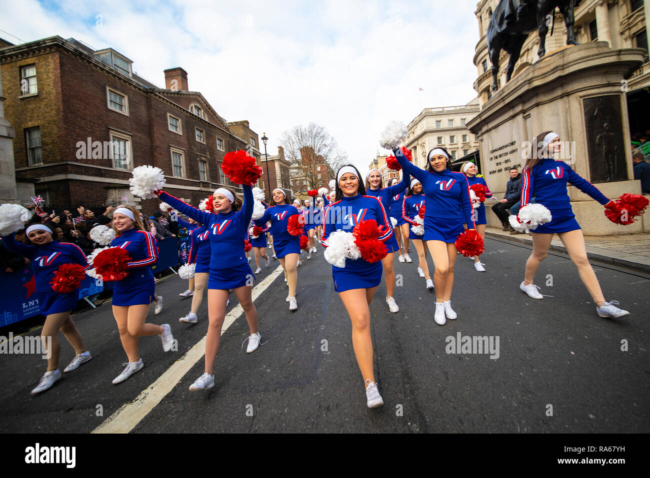 Varsity Spirit All American Cheerleaders at London's New Year's Day Parade, UK. Girl, female cheerleader performing. London 2019 Stock Photo