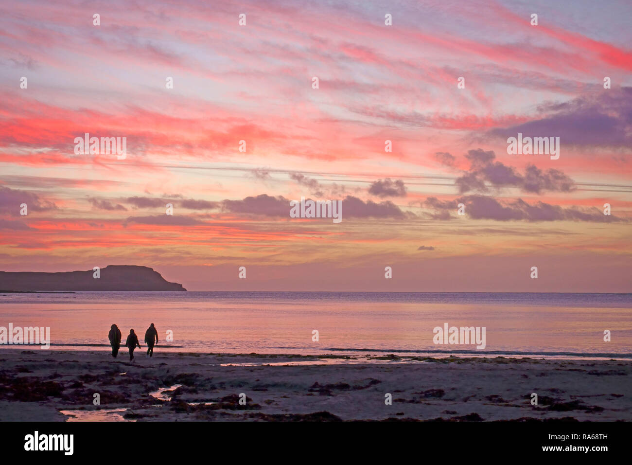 Calgary Bay, Isle of Mull, Scotland, UK. 1st January, 2019. People enjoying the sunset on the First Day of 2019 on Mull in the Inner Hebrides of Scotland Credit: PictureScotland/Alamy Live News Stock Photo