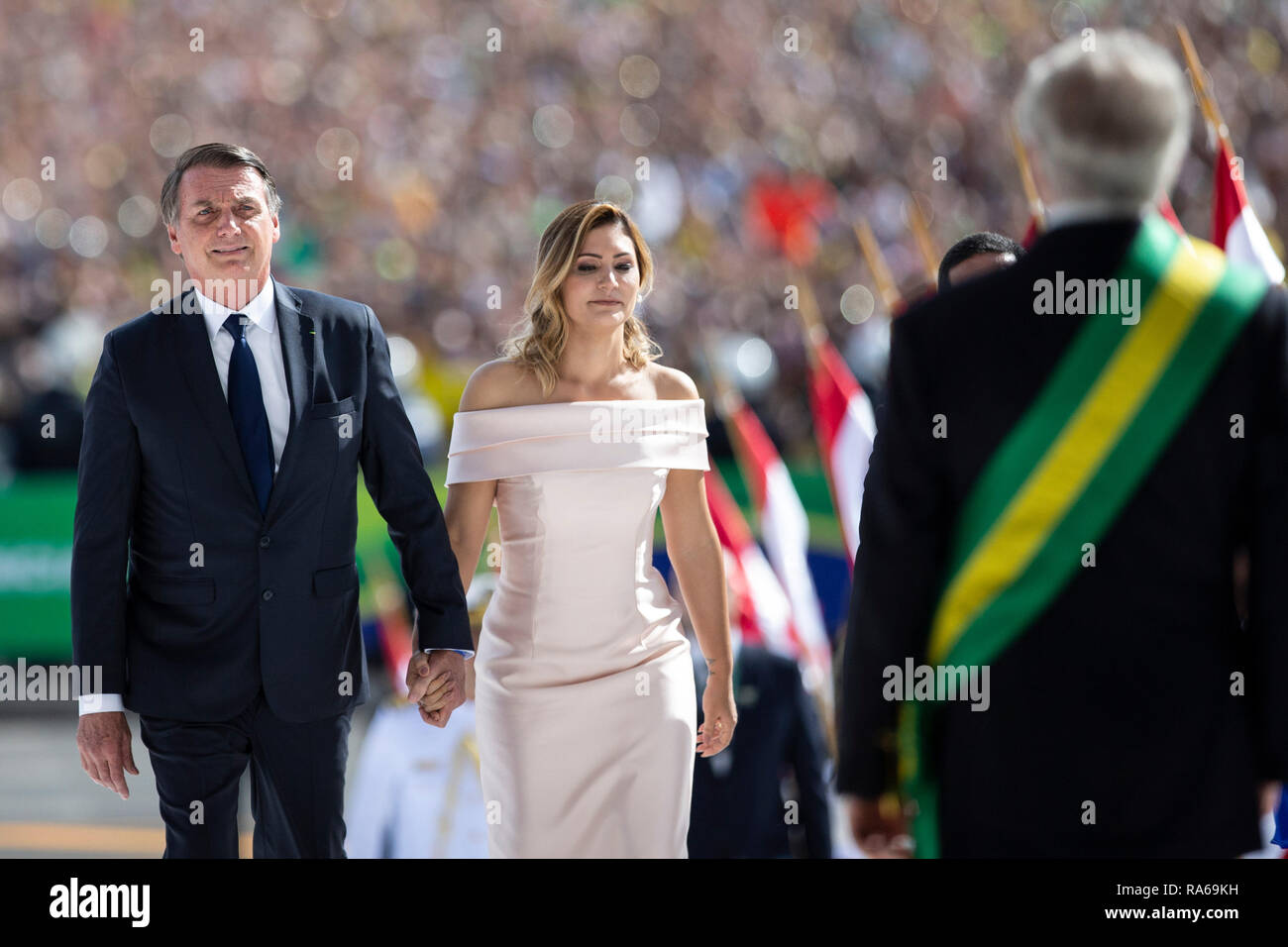 Brasilia, Brazil. 1st Jan, 2019. Jair Bolsonaro (1st L) and his wife Michelle Bolsonaro attend the inauguration ceremony in Brasilia, capital of Brazil, on Jan. 1, 2019. Army captain-turned-politician Jair Bolsonaro was sworn in as Brazil's president on Tuesday amid heightened security. Credit: Li Ming/Xinhua/Alamy Live News Stock Photo