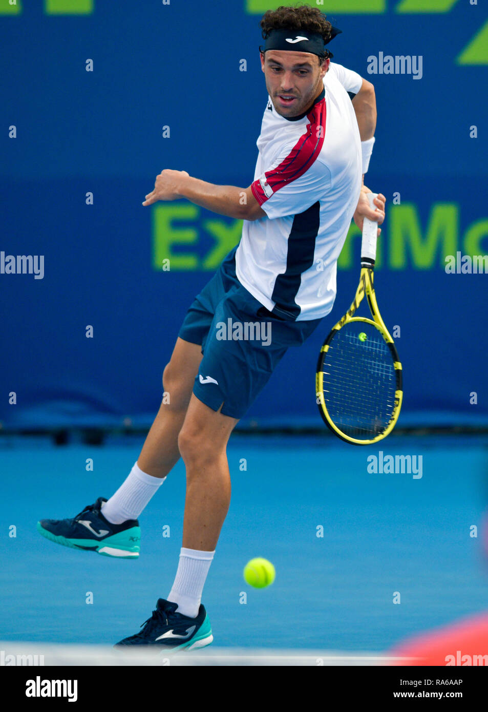 Doha, Qatar. 1st Jan, 2019. Marco Cecchinato of Italy returns the ball  during the first round match against Sergiy Stakhovsky of Ukraine at the  ATP Qatar Open Tennis match in Doha, capital