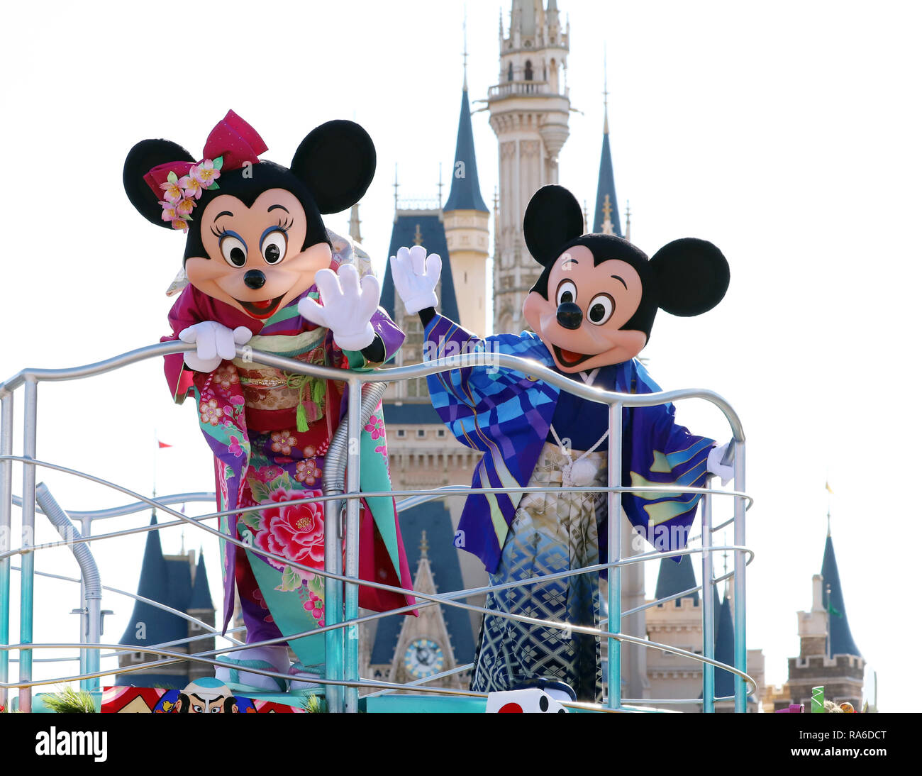 Urayasu, Japan. 1st Jan, 2019. Disney characters Mickey and Minnie Mouse  dressed in traditional kimono dresses, greet guests from a float during the  theme park's annual New Year's Day parade at the