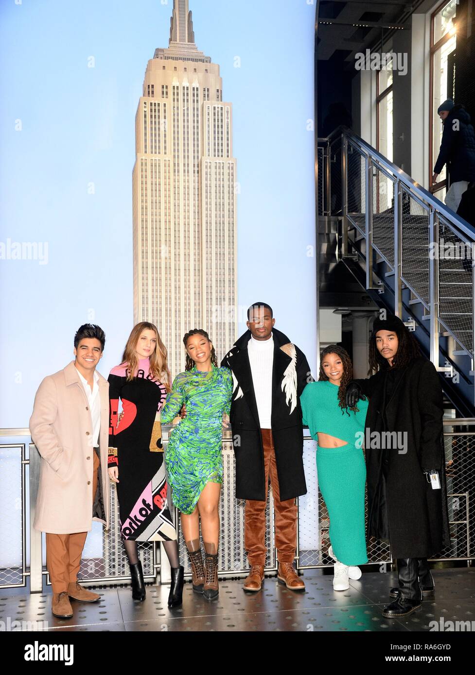 New York, NY, USA. 2nd Jan, 2019. From Right to left :Jordan Buhat, Emily Arlook, Chloe Bailey, Trevor Jackson, Halle Bailey, Luka Sabbat at a public appearance for Cast of GROWN-ISH Visits Empire State Building, The Empire State Building, New York, NY January 2, 2019. Credit: Eli Winston/Everett Collection/Alamy Live News Stock Photo