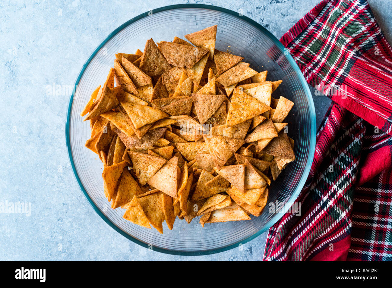Homemade Tortilla Chips made with Flatbread in Glass Bowl and Baked in