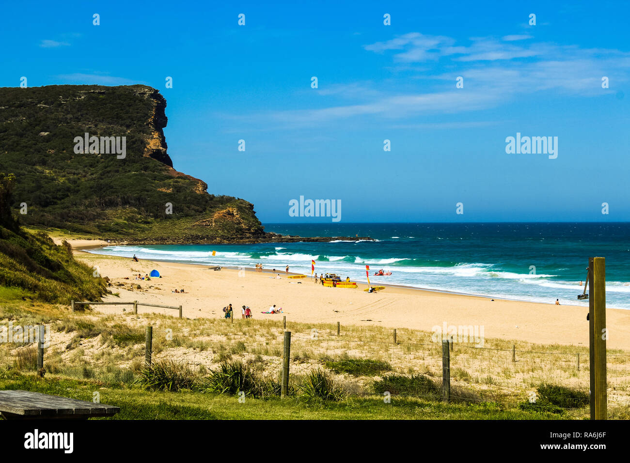 View onto the white empty Garie Beach in the Royal National Park near Sydney in summer with clear sky (Sydney, Australia) Stock Photo