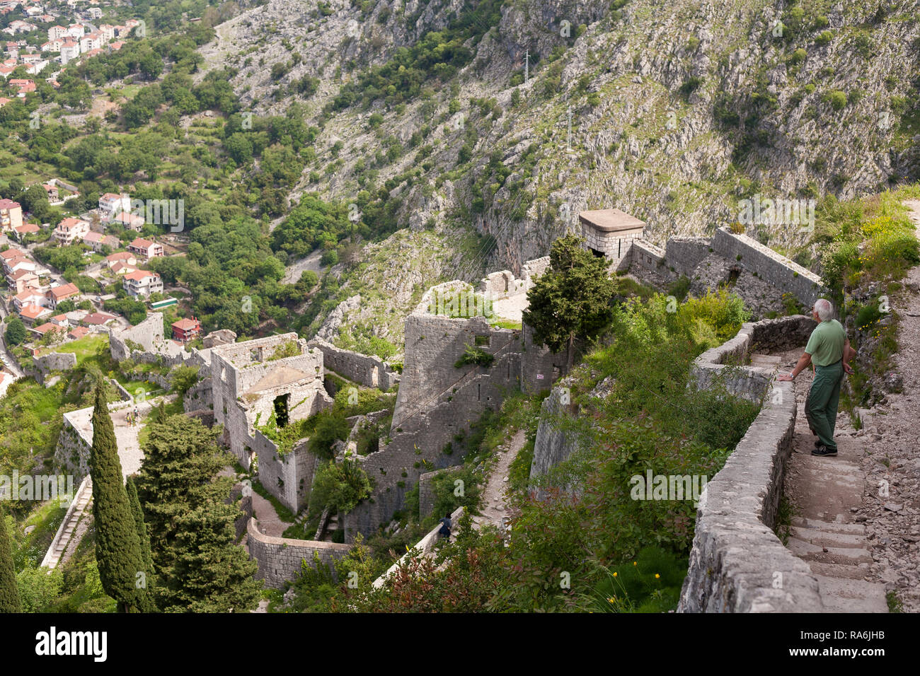 Tourists and visitors walk the path and stairs climbing to the battlements  of the castle and forts above Kotor, Montenegro Stock Photo - Alamy