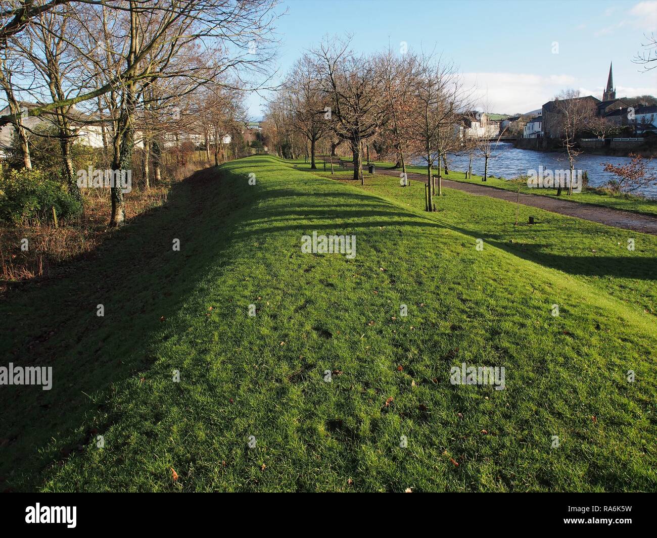 The Flood Bund built along the river Derwent to protect low lying housing, Cockermouth, Cumbria