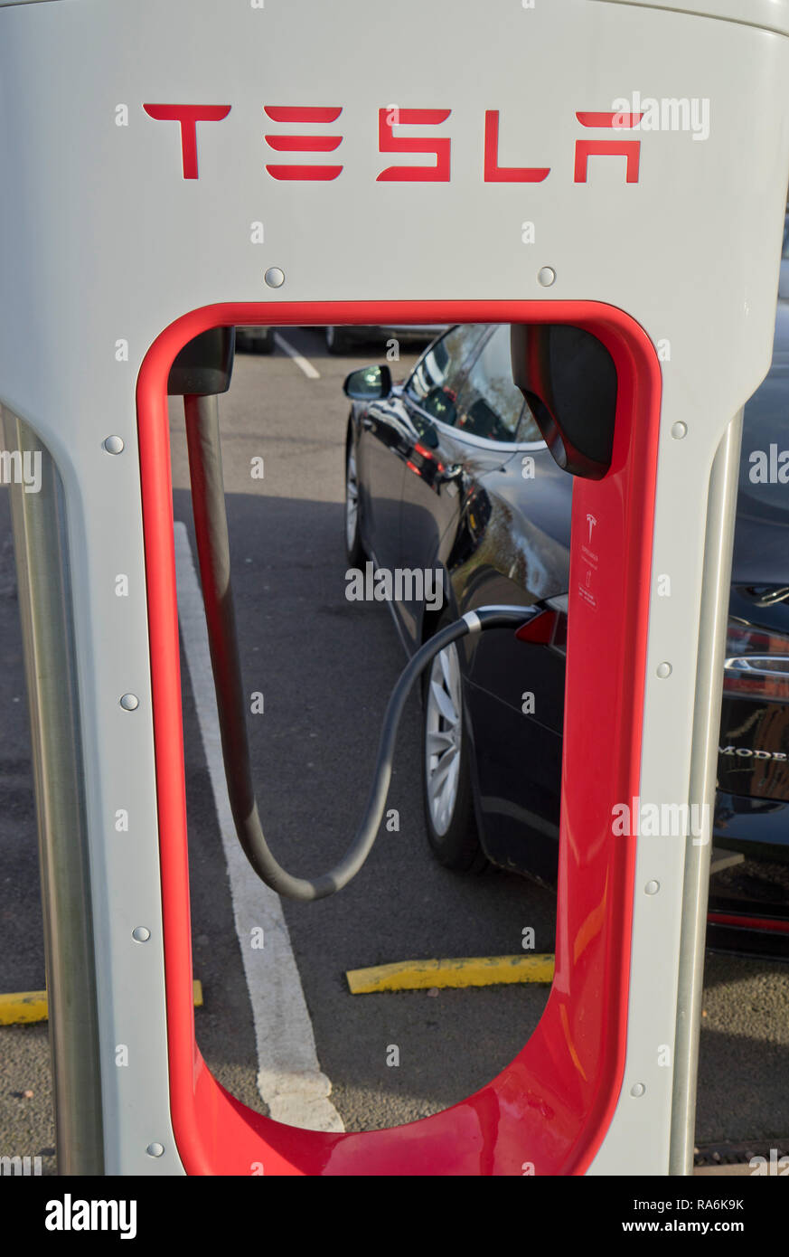 Tesla electric car charger machine at a motorway service station in