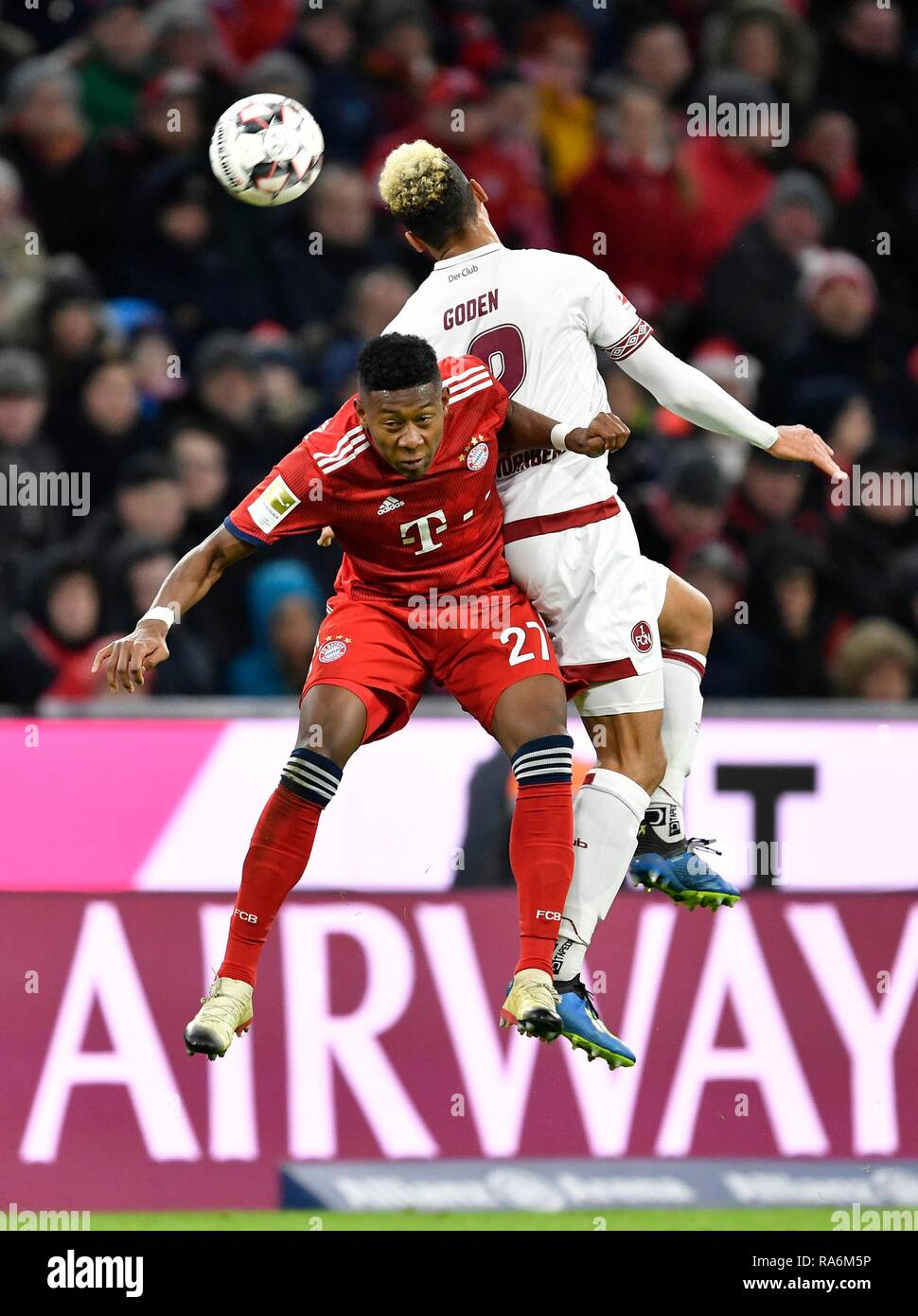 Header duel, duel, David Alaba FC Bayern Munich against Kevin Goden 1st FC Nuremberg, Allianz Arena, Munich, Bavaria, Germany Stock Photo