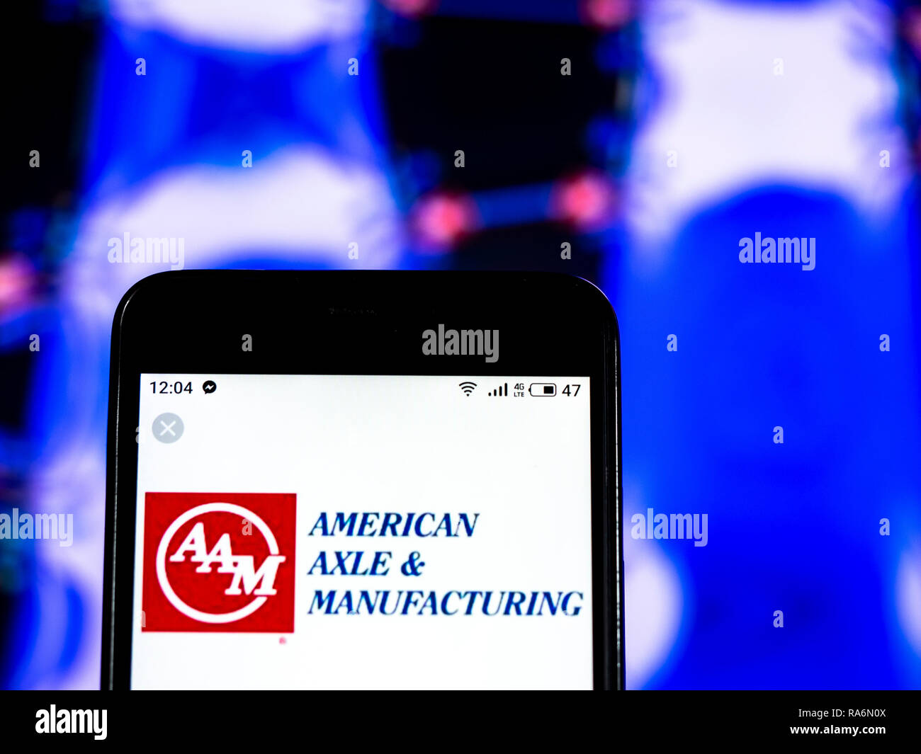American Axle Automobile company logo seen displayed on smart phone