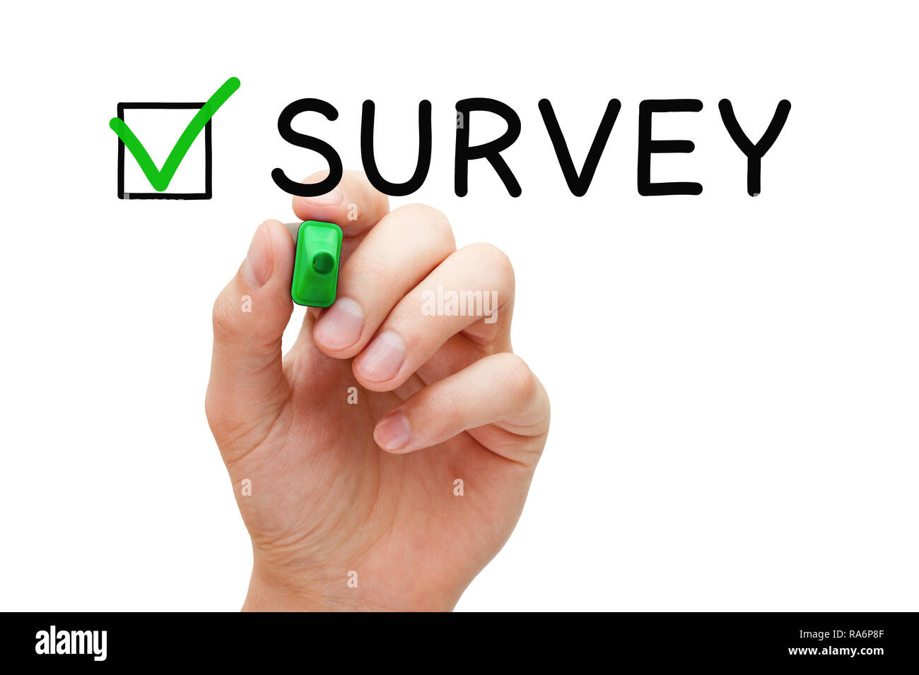Hand putting check mark on Survey with green marker on transparent wipe board isolated on white. Stock Photo