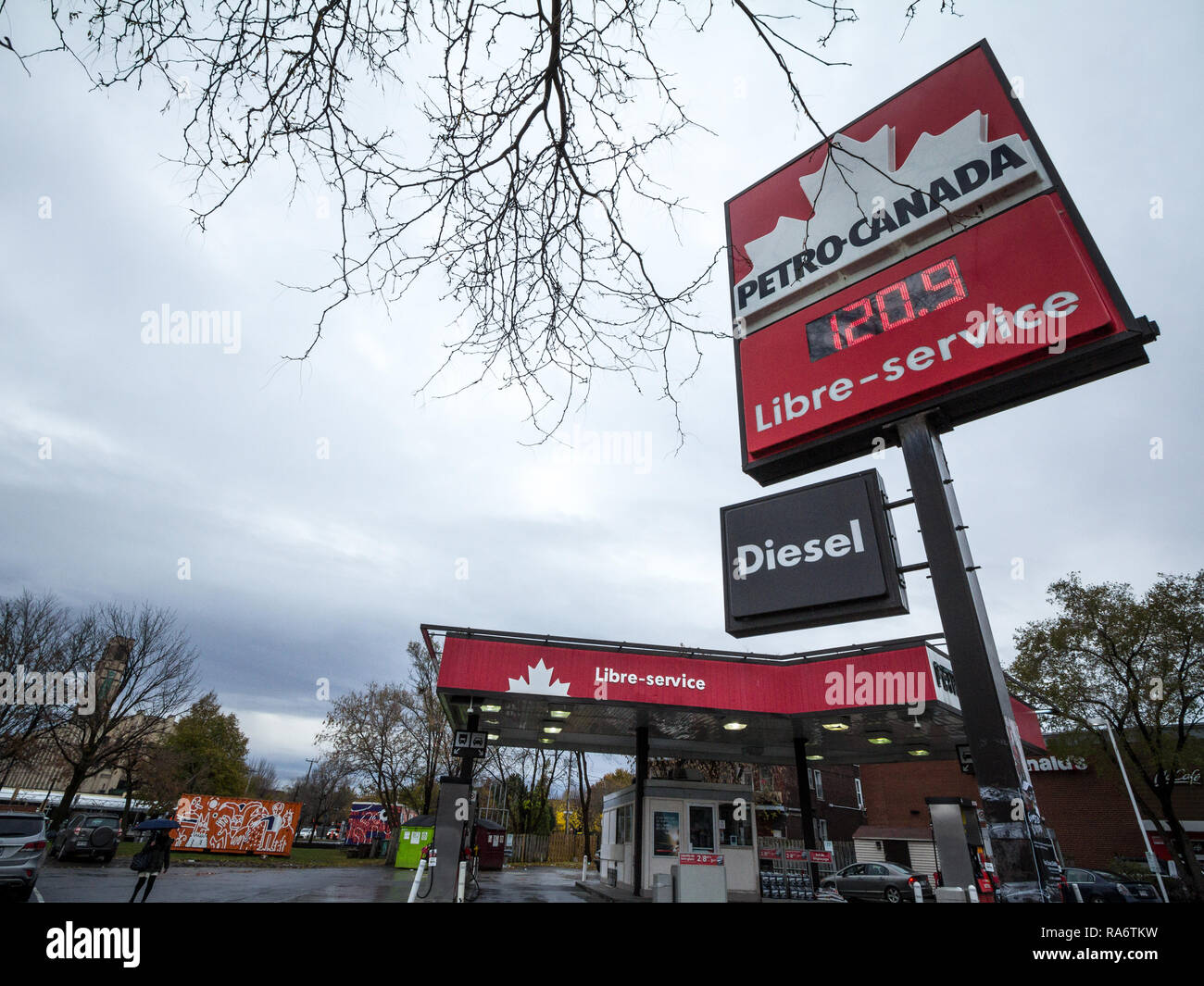 MONTREAL, CANADA - NOVEMBER 6, 2018: Petro-Canada logo in front of one of their gas stations in Canada. Belonging to Suncor Energy, petro Canada is a  Stock Photo