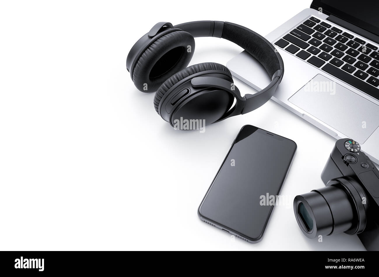 Electronic device - Laptop, smartphone, camera and headphone isolated on white background Stock Photo