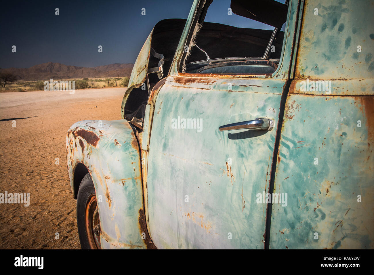 Details from old car wreck in the desert Stock Photo - Alamy
