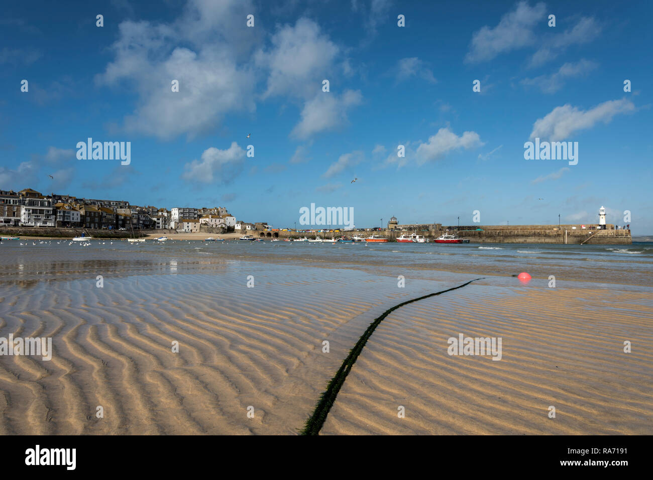 Ripples in the Sand on a sunny day St Ives Harbour Cornwall UK Stock Photo