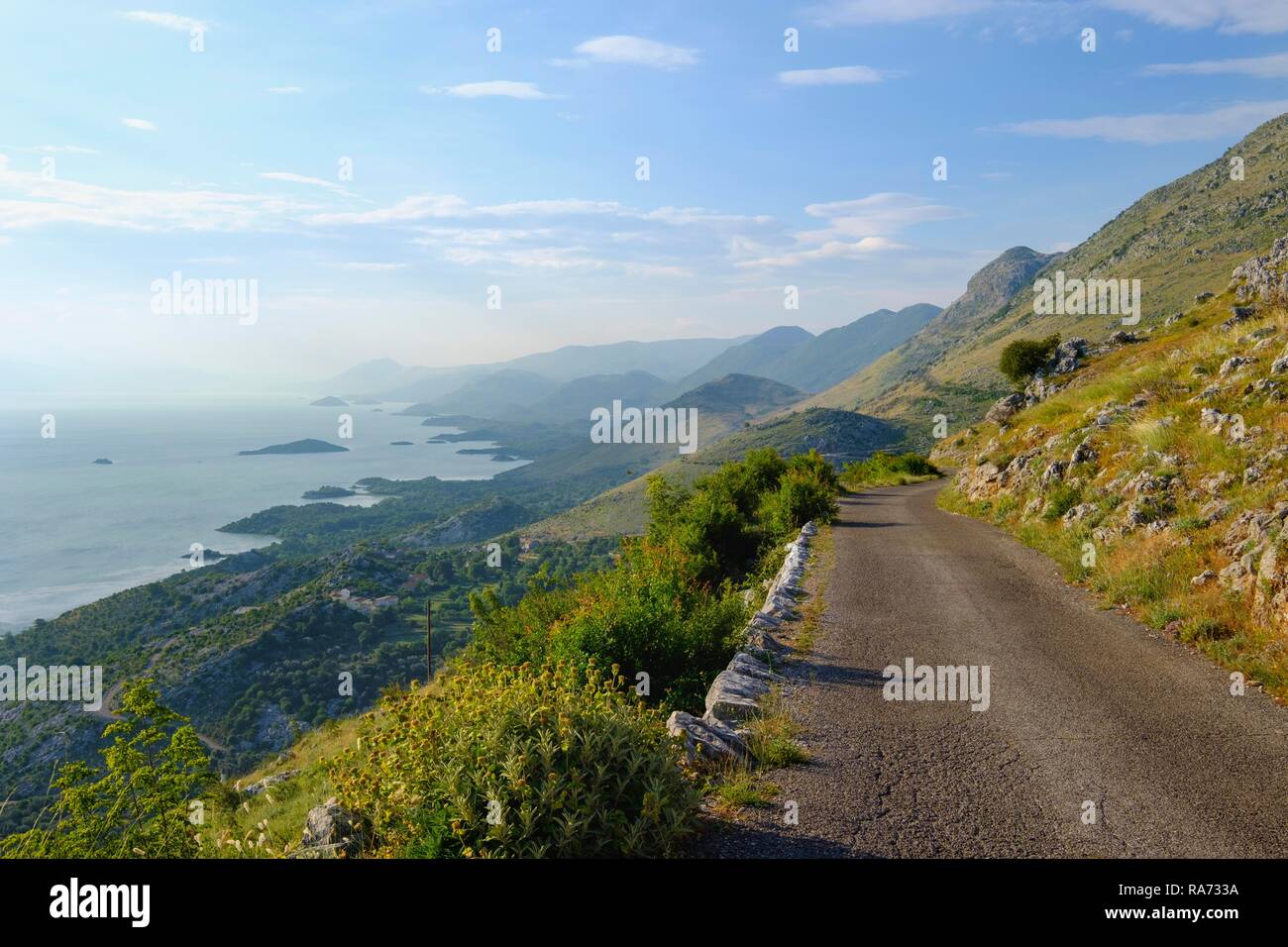Mountain road on the southern shore of Lake Skadar, Skadarsko Jezero, Lake Skadar National Park, near Bar, Montenegro Stock Photo