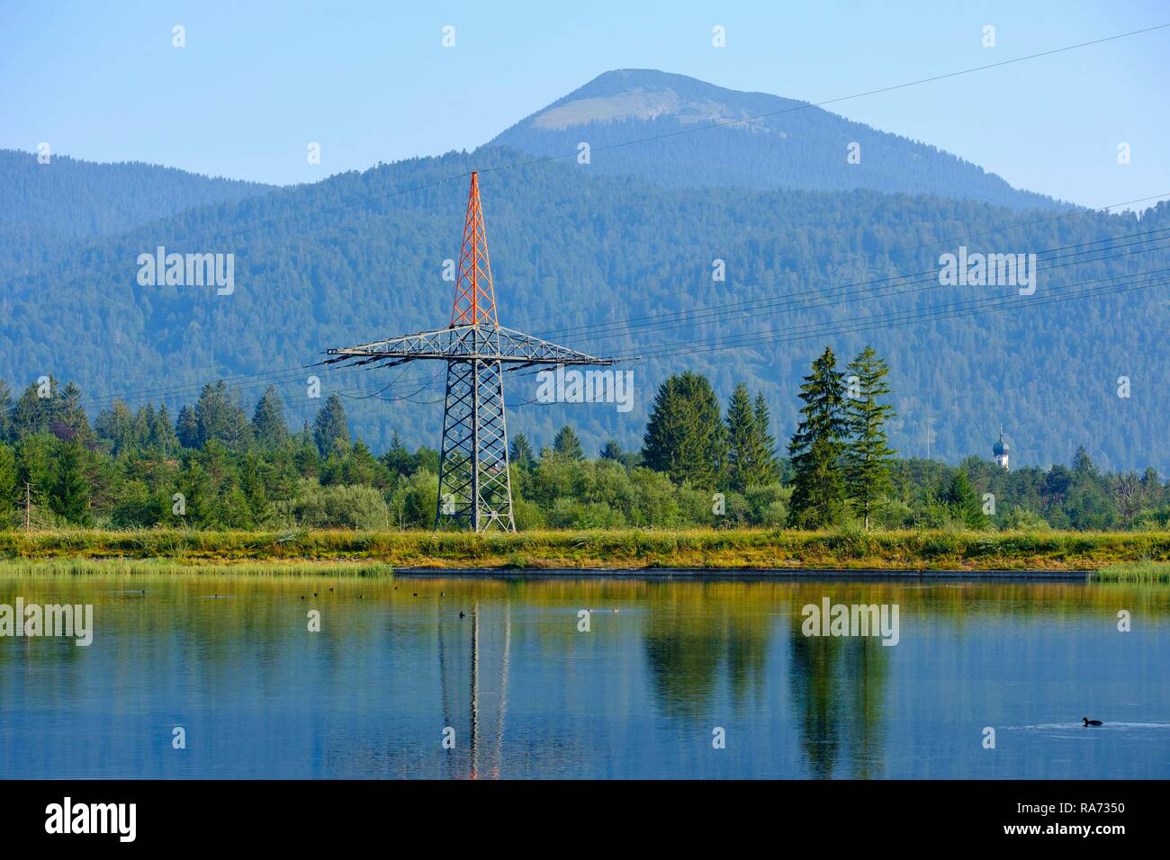 Power pole and high-voltage line, Isar reservoir Krün, Werdenfelser Land, Upper Bavaria, Bavaria, Germany Stock Photo