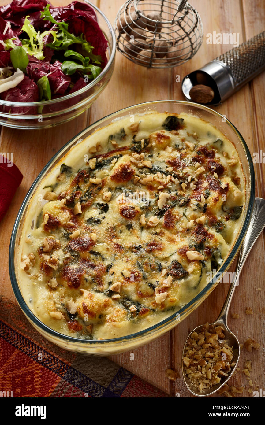 Baked gnocchi with blue cheease and spinach Stock Photo Alamy