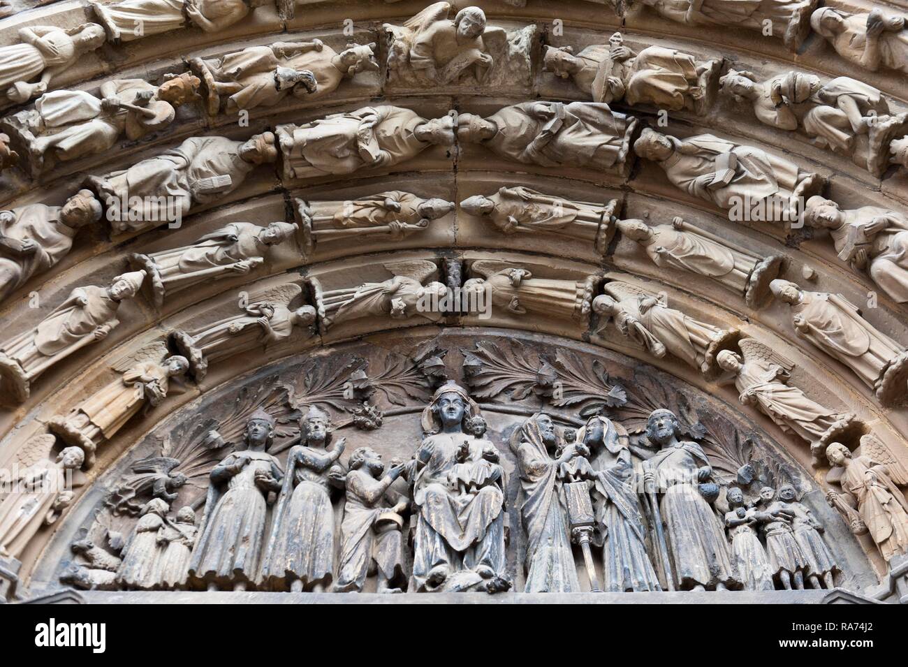 Figures in the tympanum at the main portal, Trier Cathedral, Hohe Domkirche St. Peter zu Trier, Rhineland-Palatinate, Germany Stock Photo
