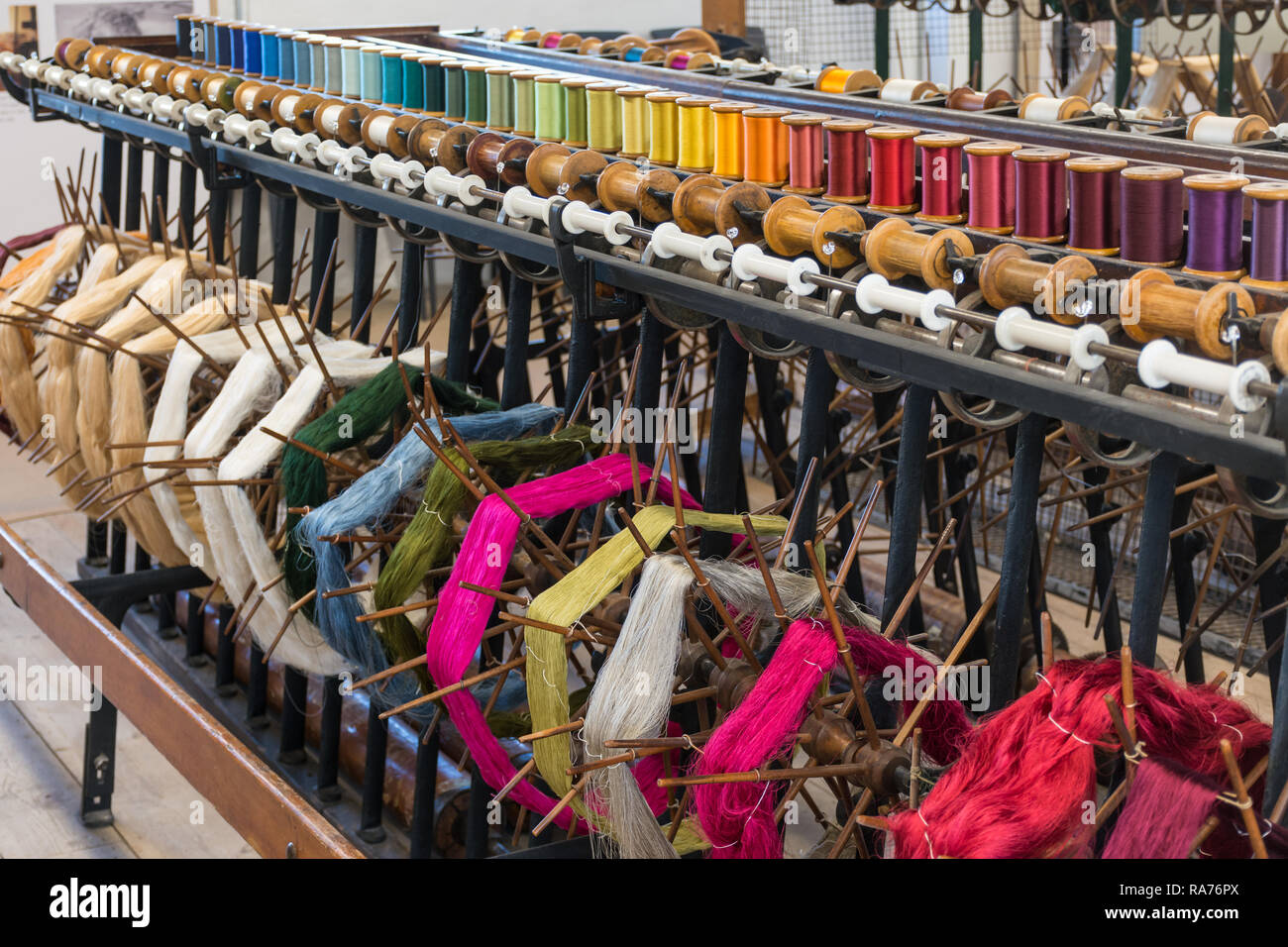 Linen and silk yarn bobbins Stock Photo by ©varbenov1 36475725