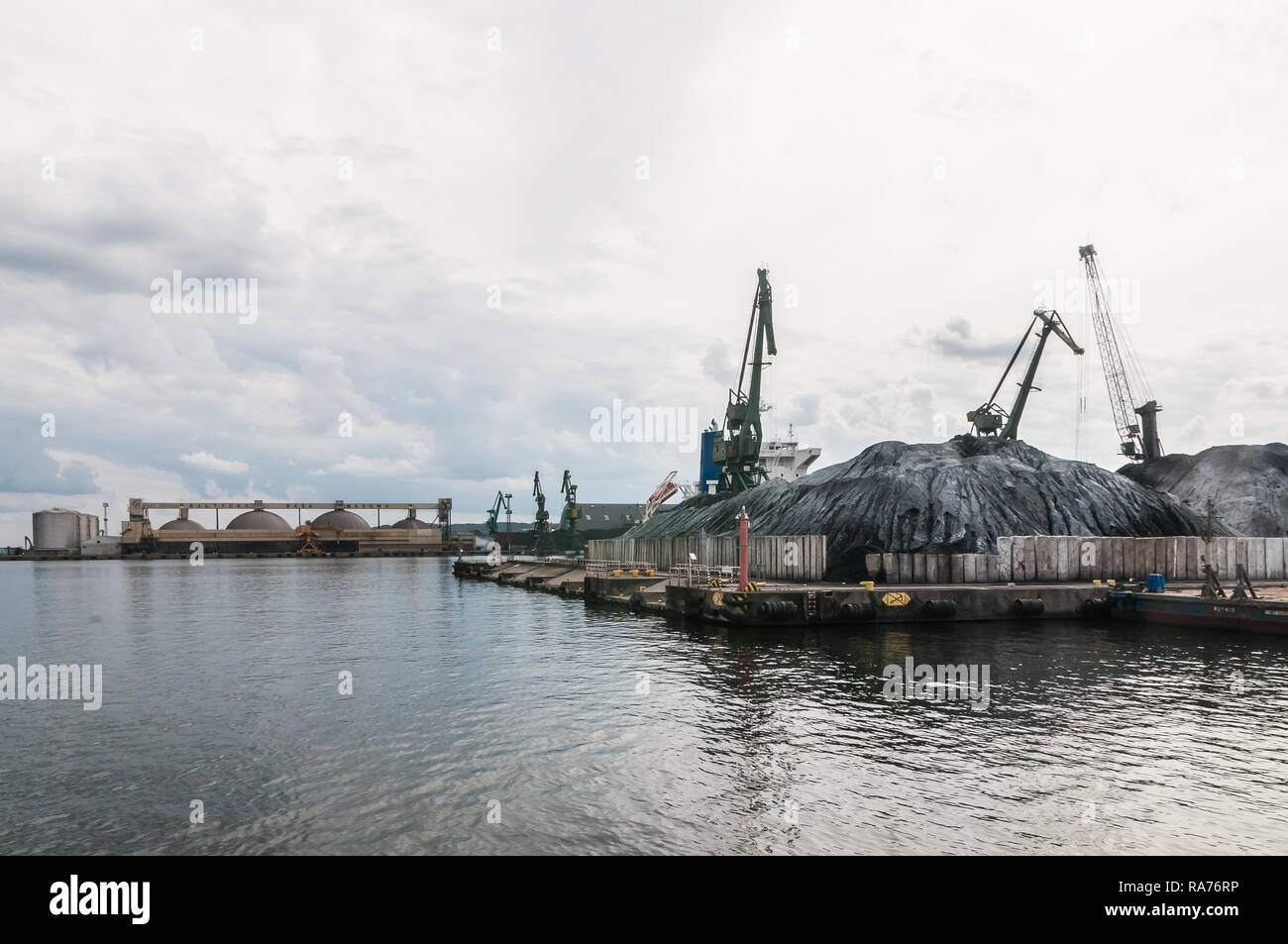 Gdynia, Poland. August 25, 2018: Views from excursion ship around  Gdynia Harbour. Cranes and vessels at wharf Stock Photo