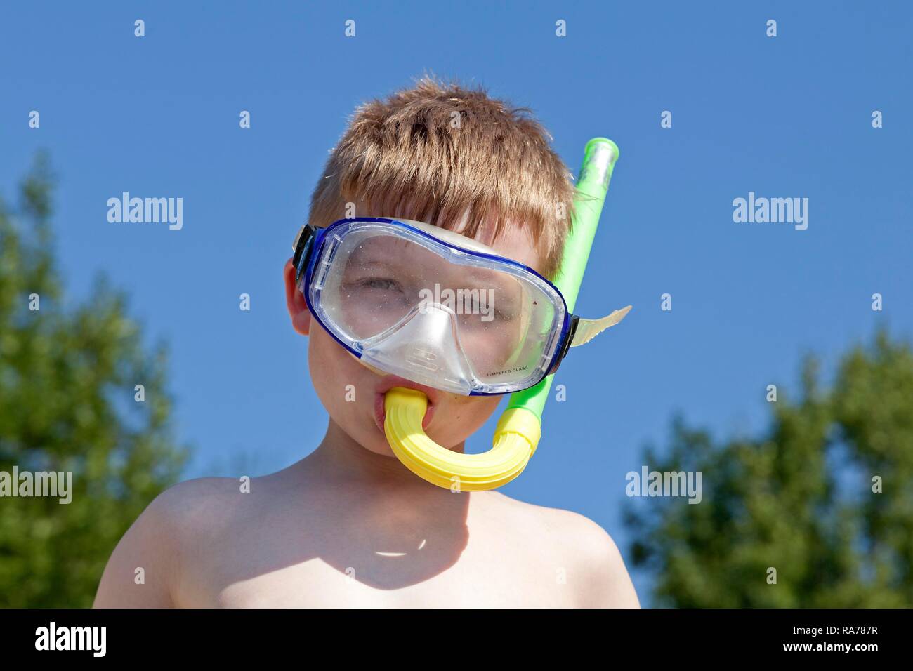 Boy with diving mask and snorkel, near Donja Klada, Kvarner Gulf, Croatia Stock Photo