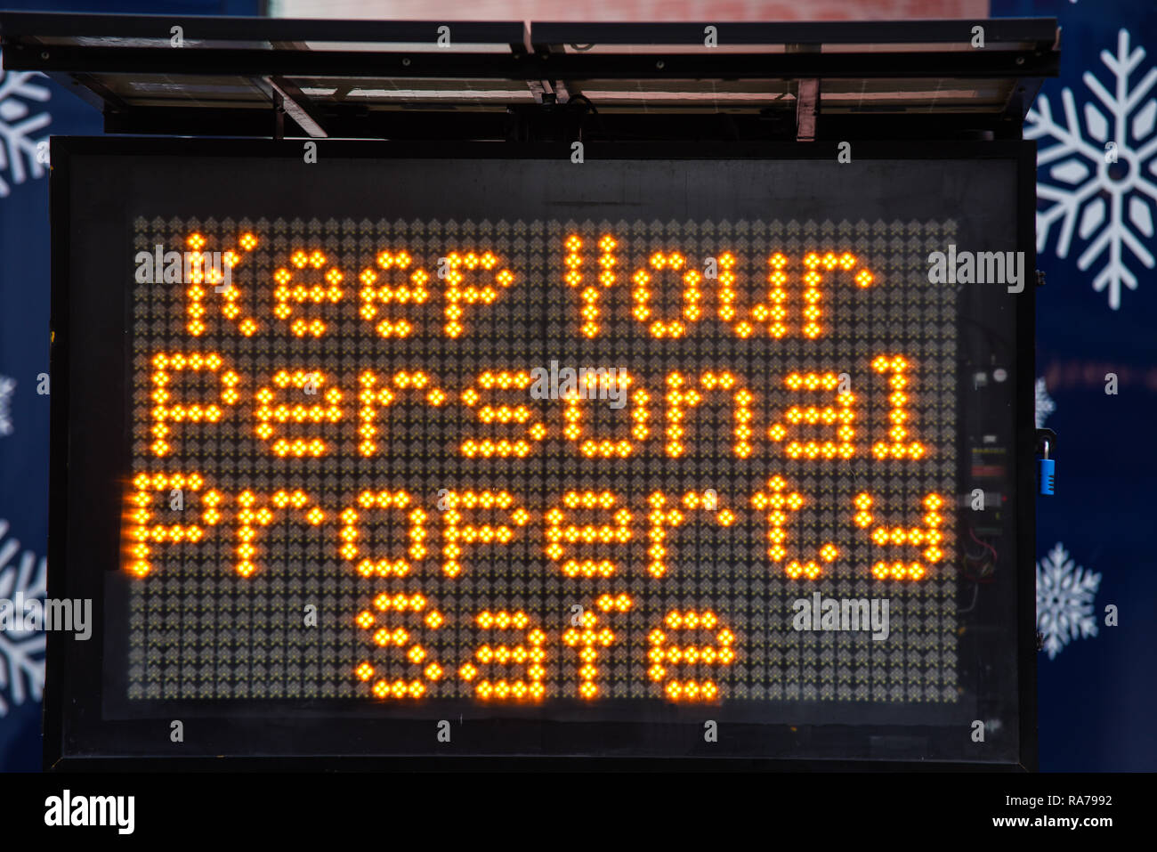 Keep your personal property safe matrix sign for New Year's Eve revelers in London, UK. Warning message Stock Photo