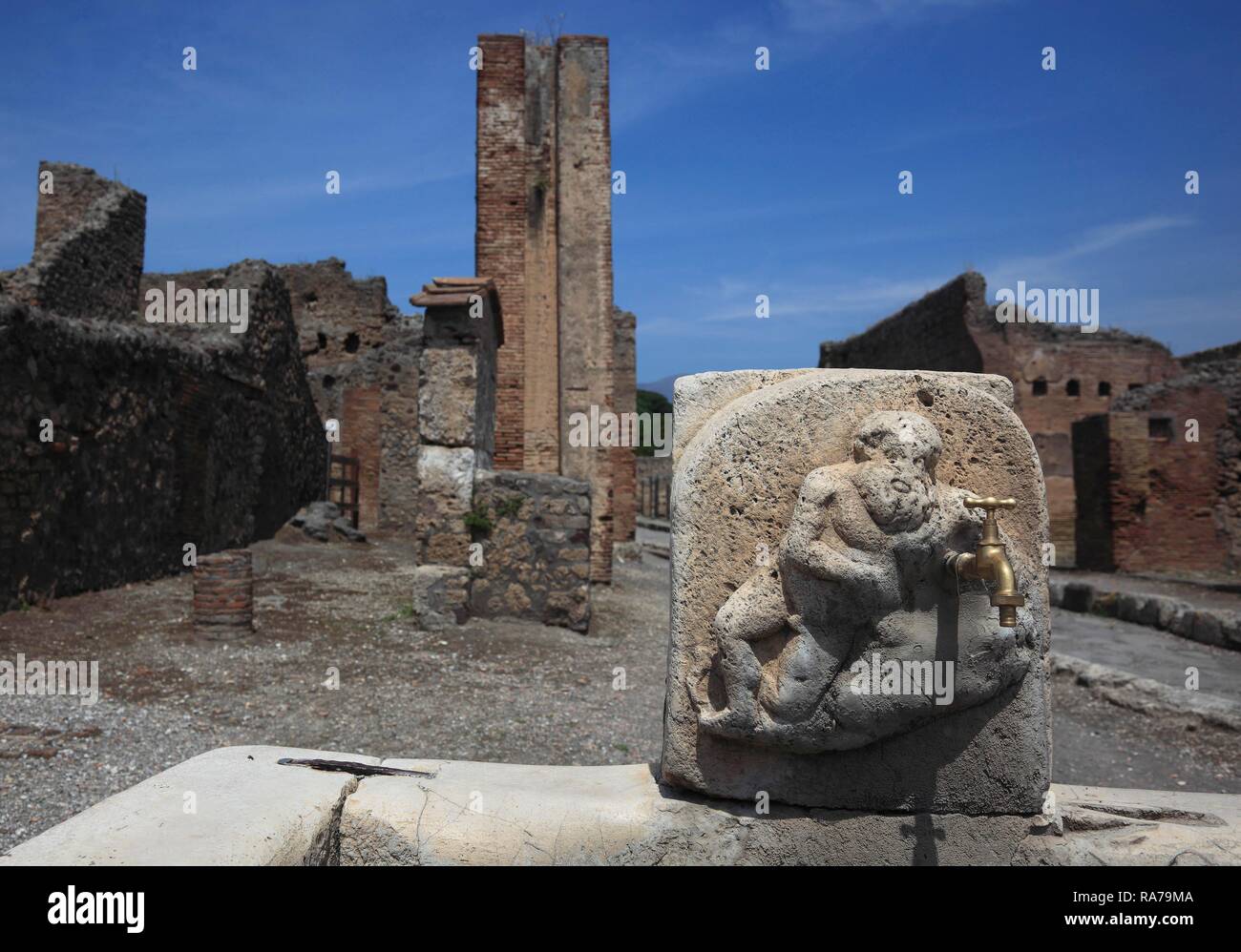 Well in one of the former residential streets in Pompeii, Campania, Italy, Europe Stock Photo