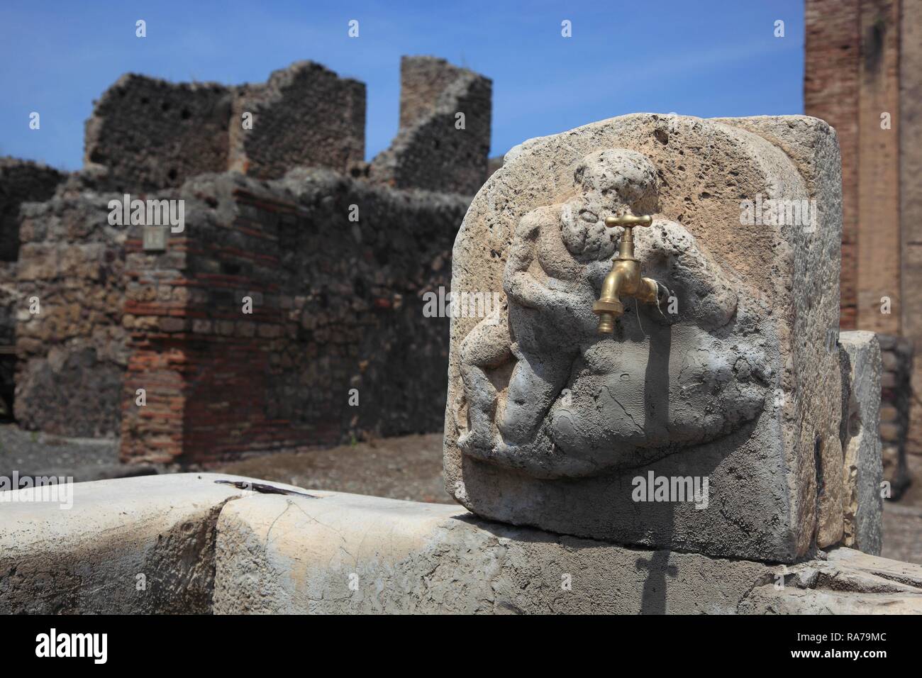 Well in one of the former residential streets in Pompeii, Campania, Italy, Europe Stock Photo