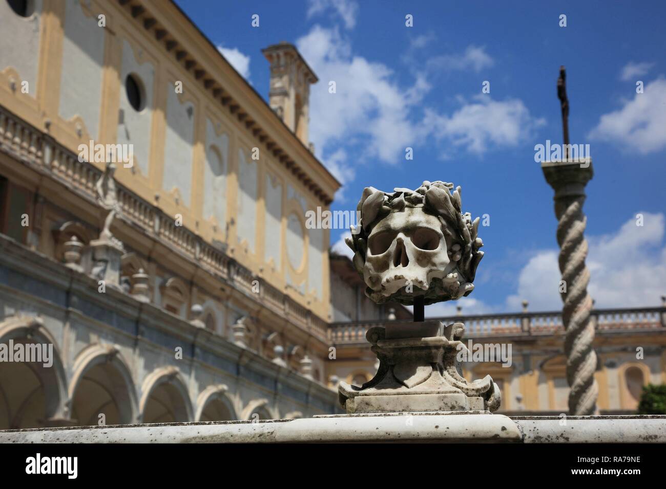 Skull on the balustrade of the monastic cemetery, big cloister of the Certosa di San Martino monastery Stock Photo