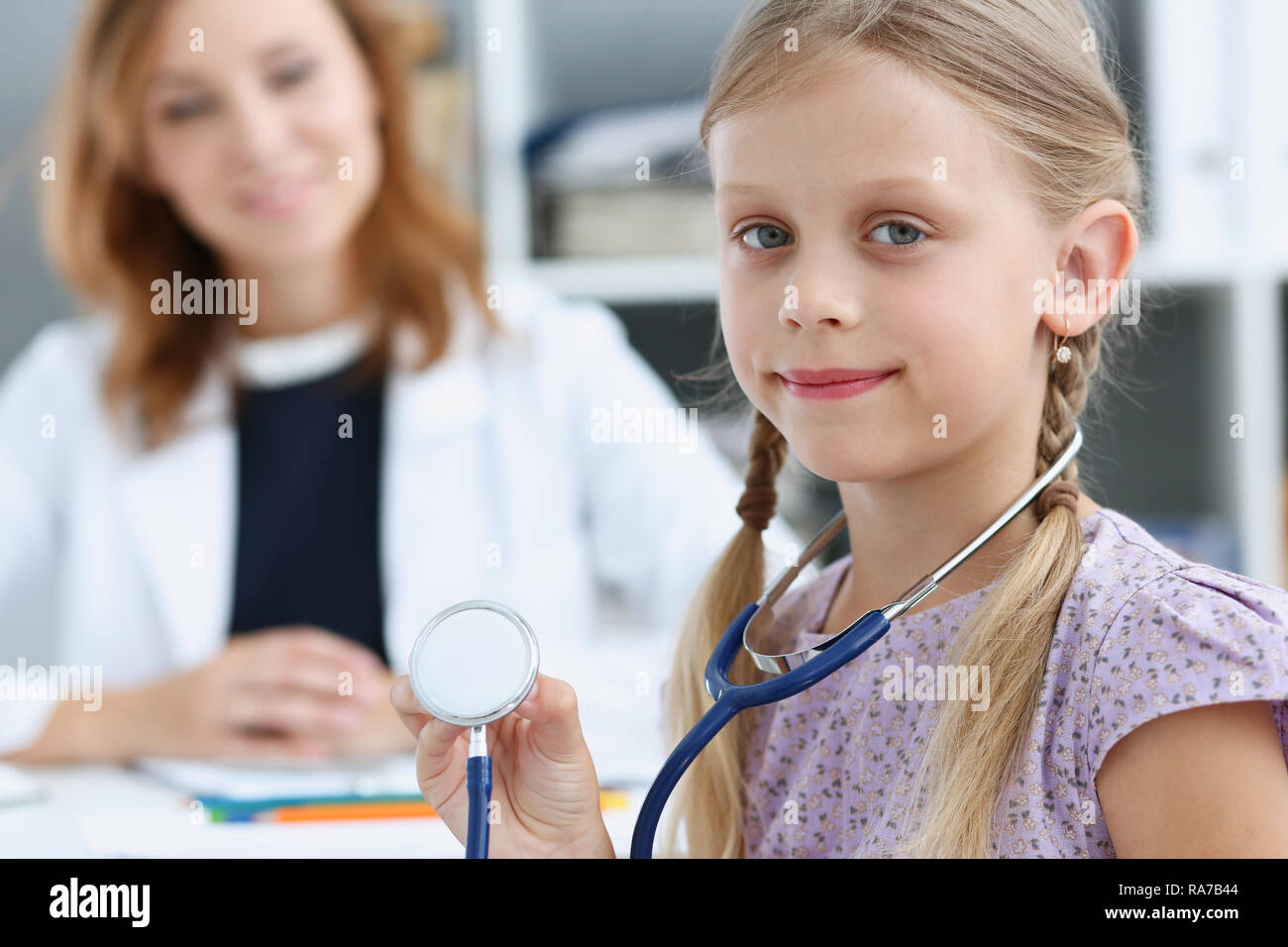 Little child at pediatrician reception Stock Photo Alamy