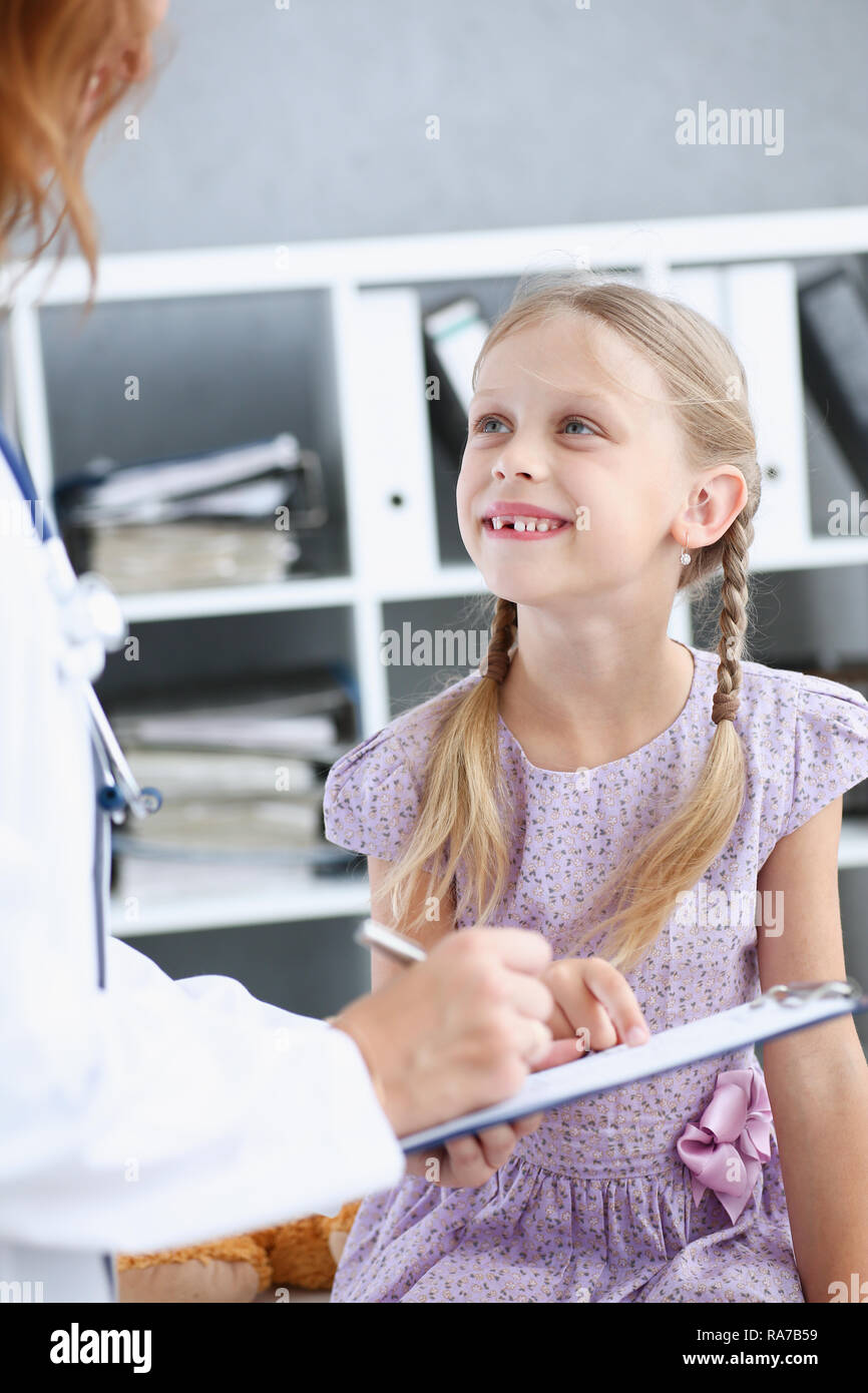 Little child at pediatrician reception Stock Photo Alamy