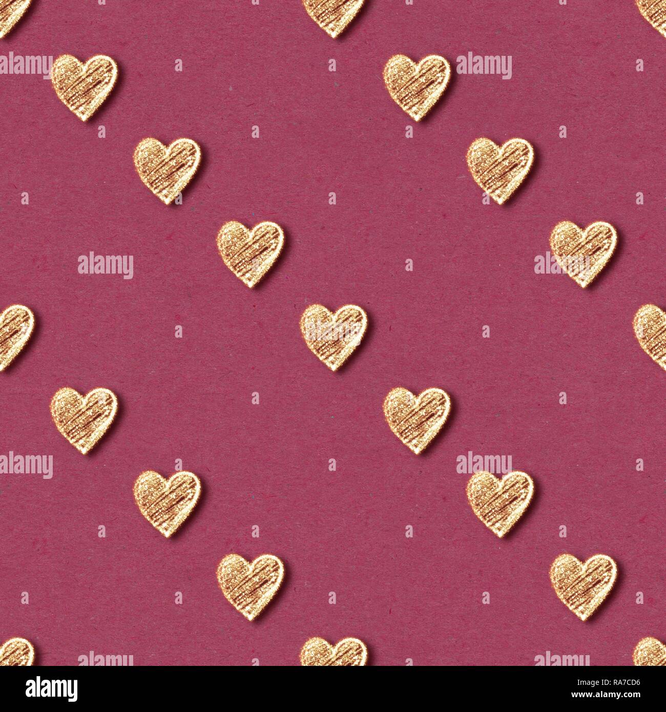 Golden hearts seamless pattern on red background Stock Photo - Alamy