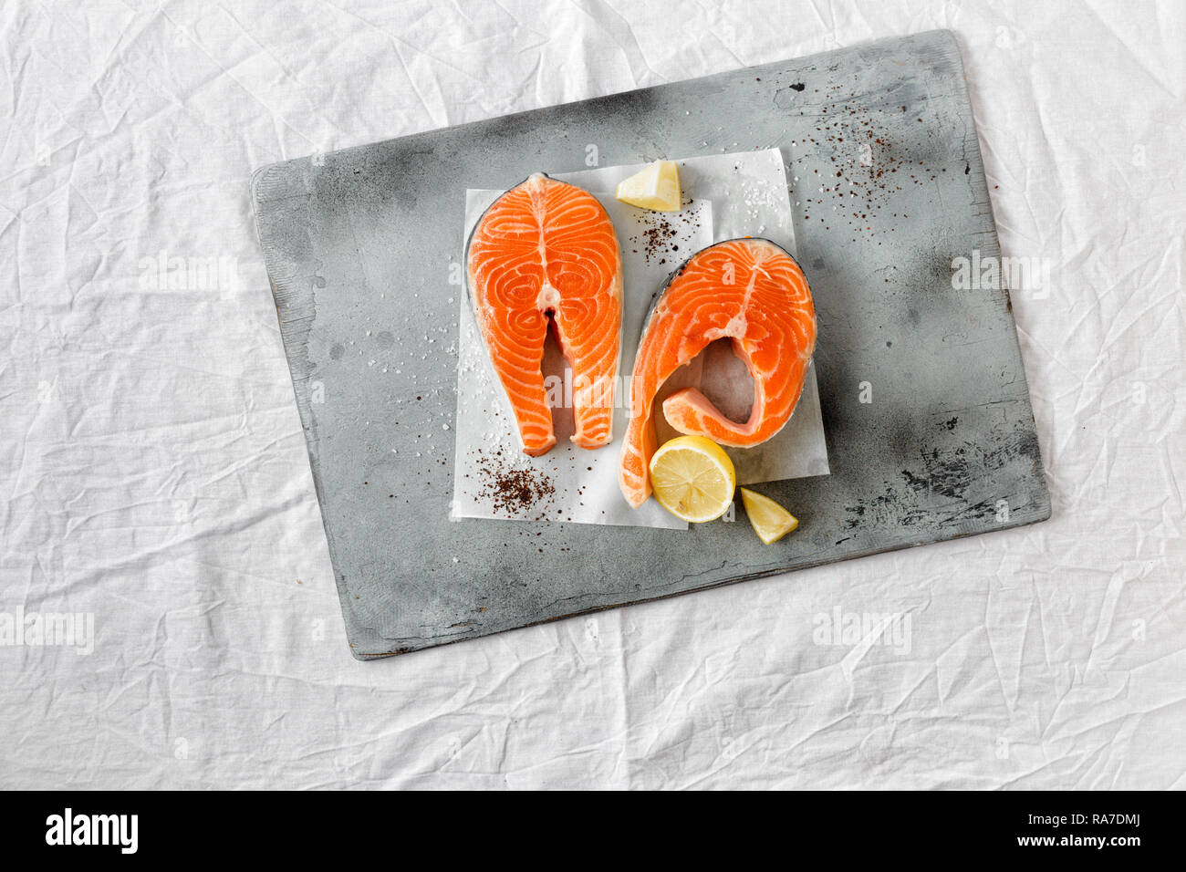 Fresh raw salmon fish steak top view, flat lay Stock Photo - Alamy