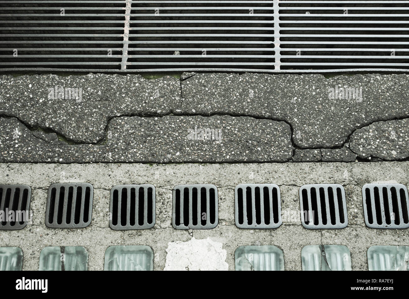 sewer grate and manhole Stock Photo