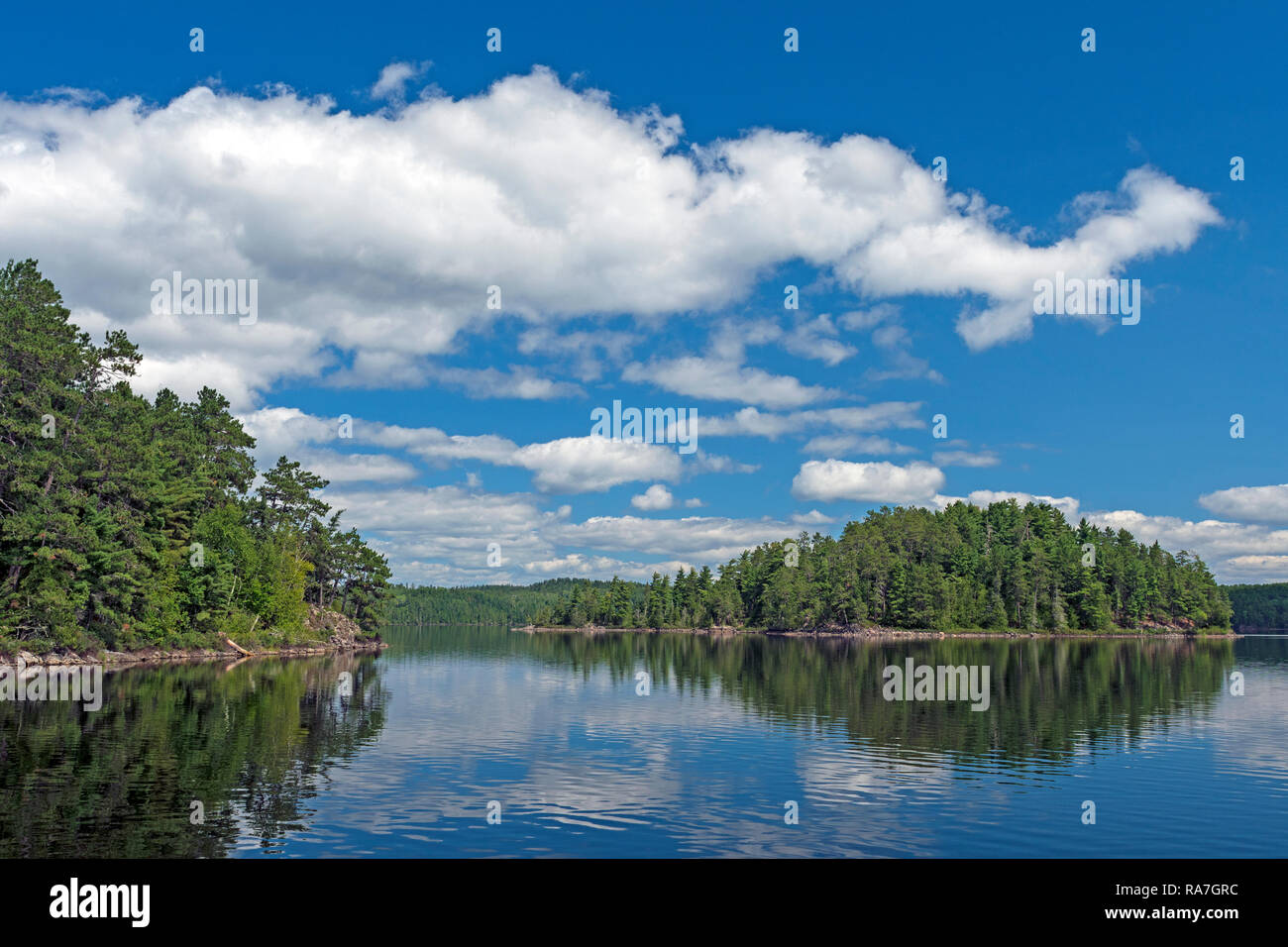 Puffy Clouds in Summer on Cache Bay in the North Woods of Quetico