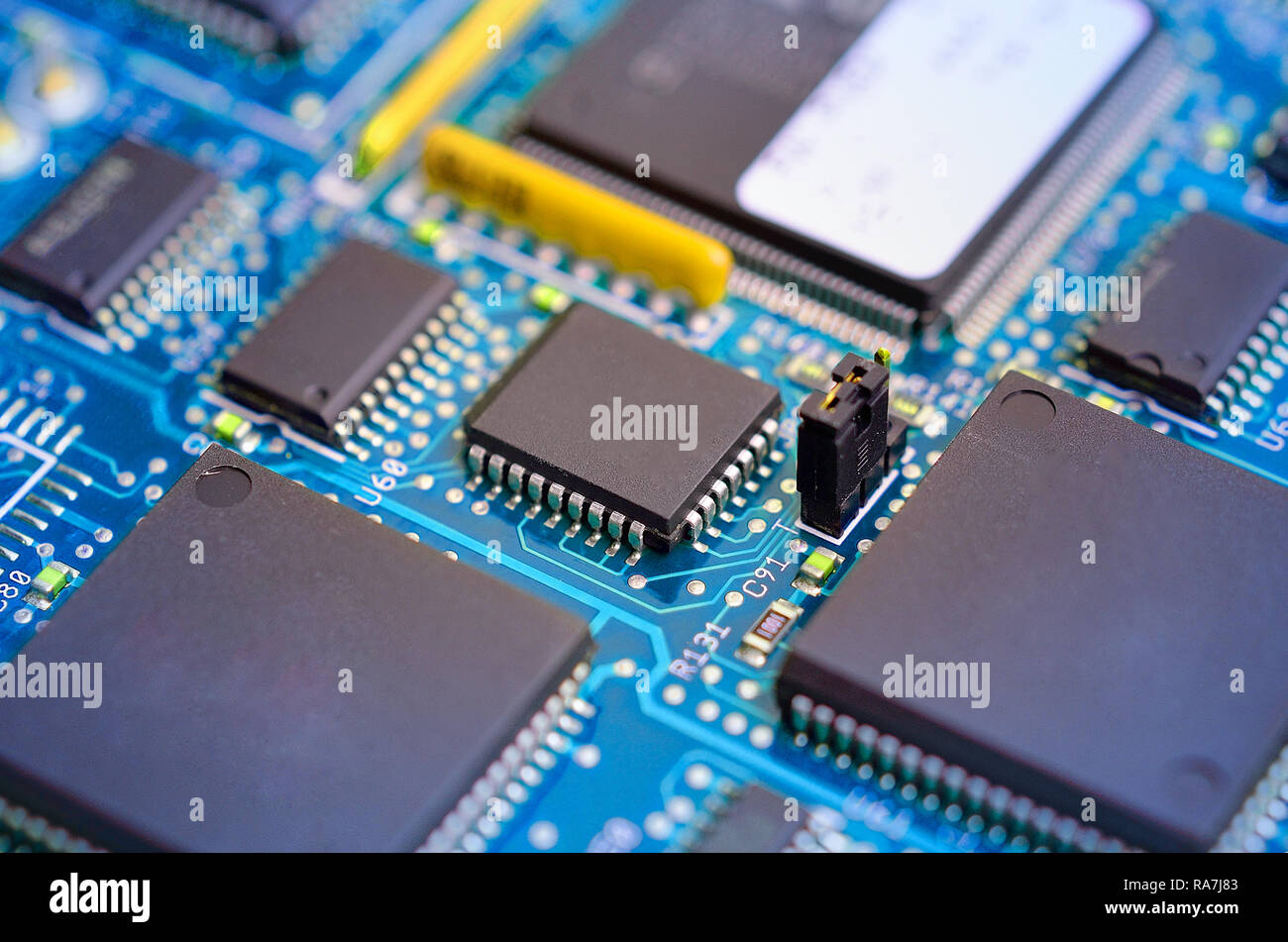 Microchips on a circuit board Stock Photo - Alamy