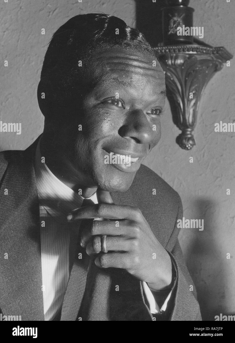 Nat King Cole. March 17, 1919 - Febryary 15, 1965. American jazz pianist and singer. Pictured here during a visit to Stockholm Sweden 1954 when performing there. Photo Kristoffersson. Stock Photo