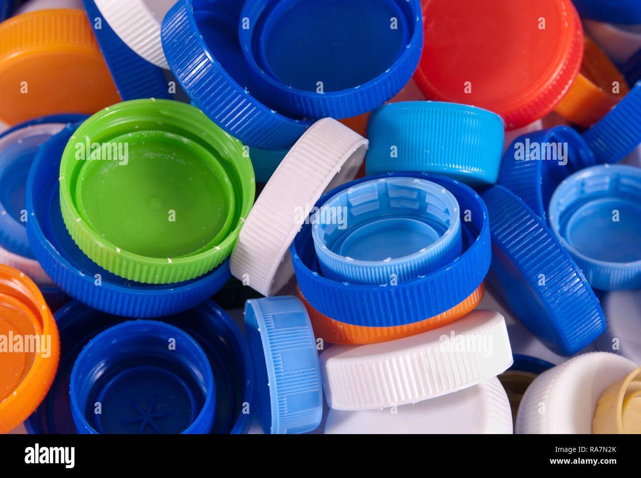 Plastic bottle caps as a background. Close up image Stock Photo