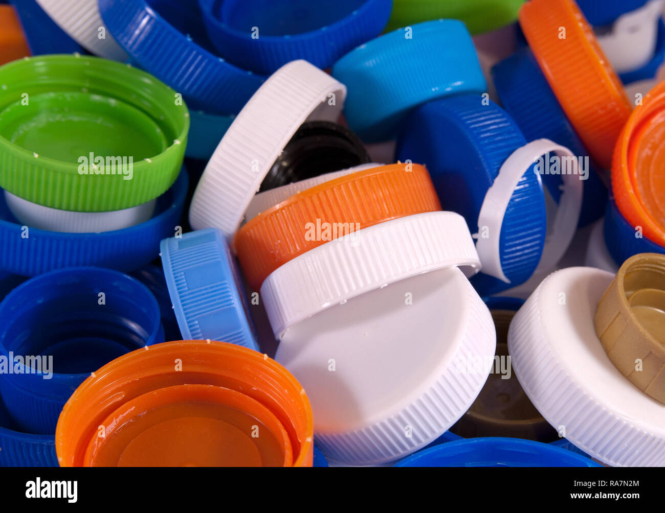 Plastic bottle caps as a background. Close up image Stock Photo