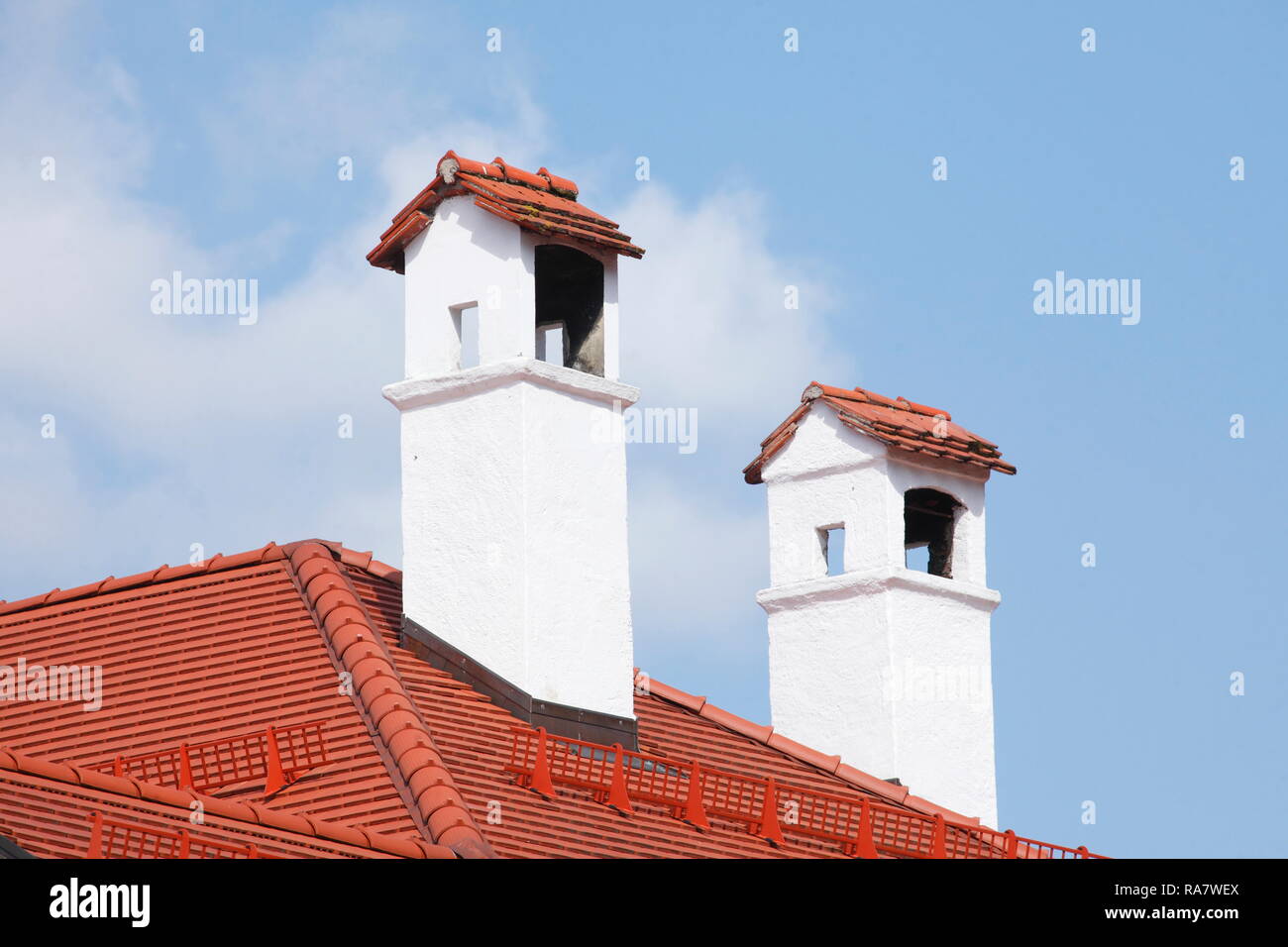 White chimneys made of stone on the roof of a house, Tegernsee, Upper Bavaria, Bavaria, Germany, Europe I  Weisse Schornsteine aus Stein auf dem Dach  Stock Photo