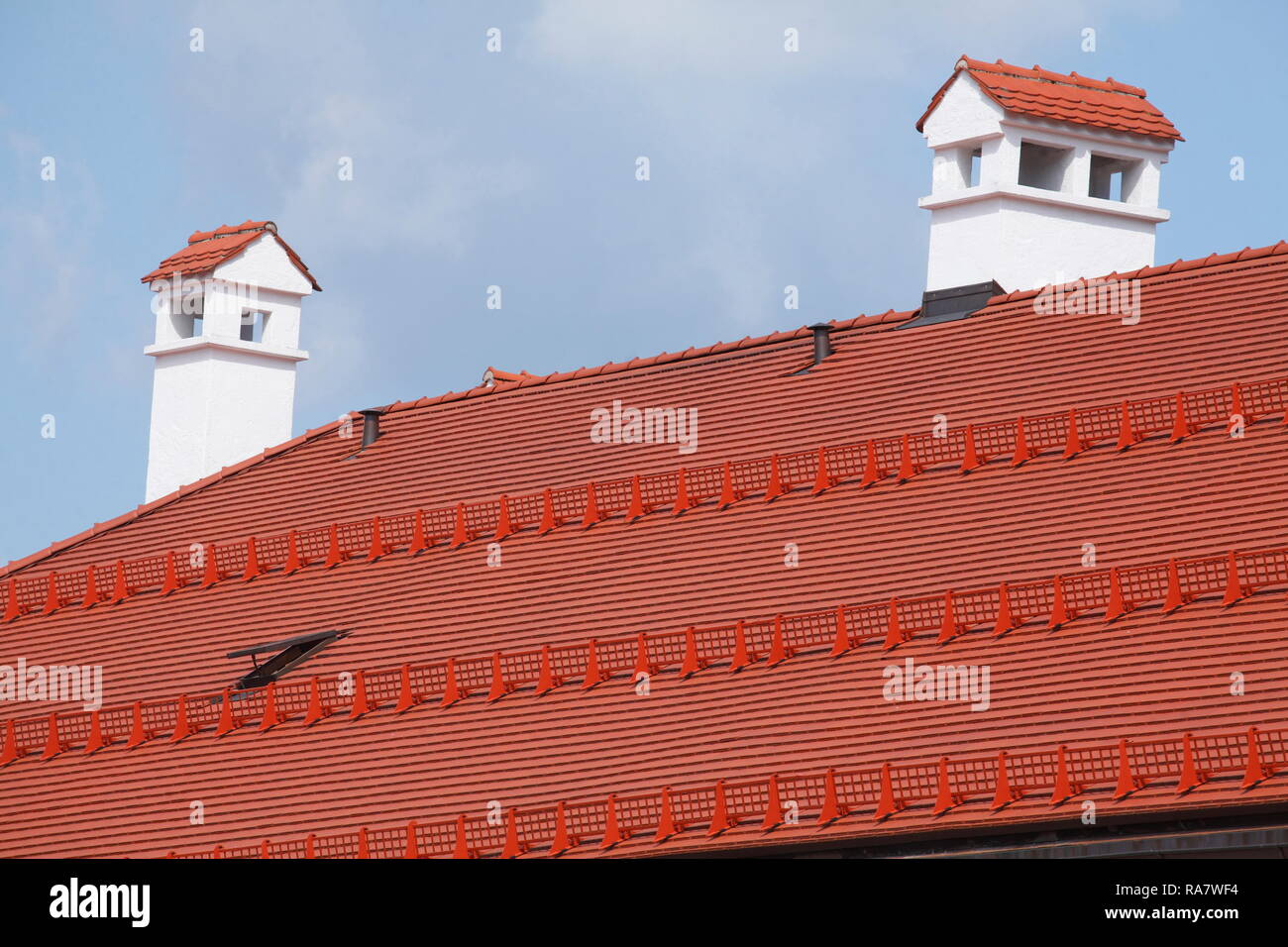 White chimneys made of stone on the roof of a house, Tegernsee, Upper Bavaria, Bavaria, Germany, Europe I  Weisse Schornsteine aus Stein auf dem Dach  Stock Photo