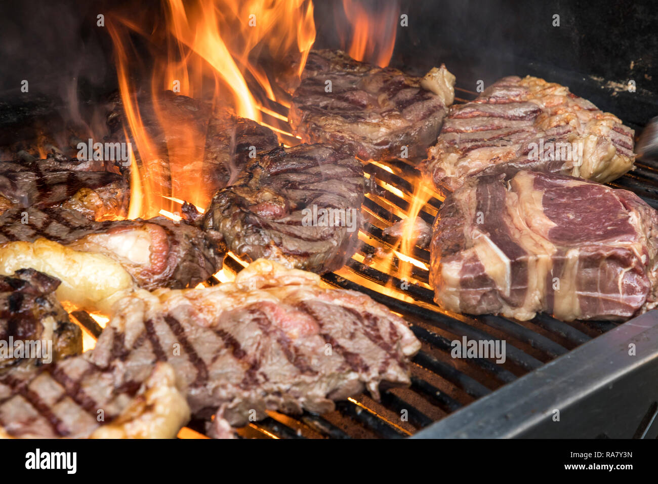 Steaks, from Galloway beef, are roasted on a grill, Stock Photo