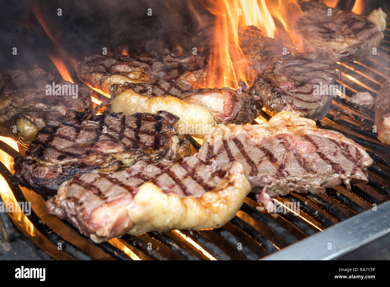 Steaks, from Galloway beef, are roasted on a grill, Stock Photo