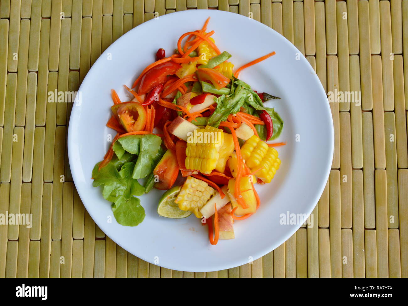 spicy mixed fruit and vegetable salad on dish Stock Photo Alamy