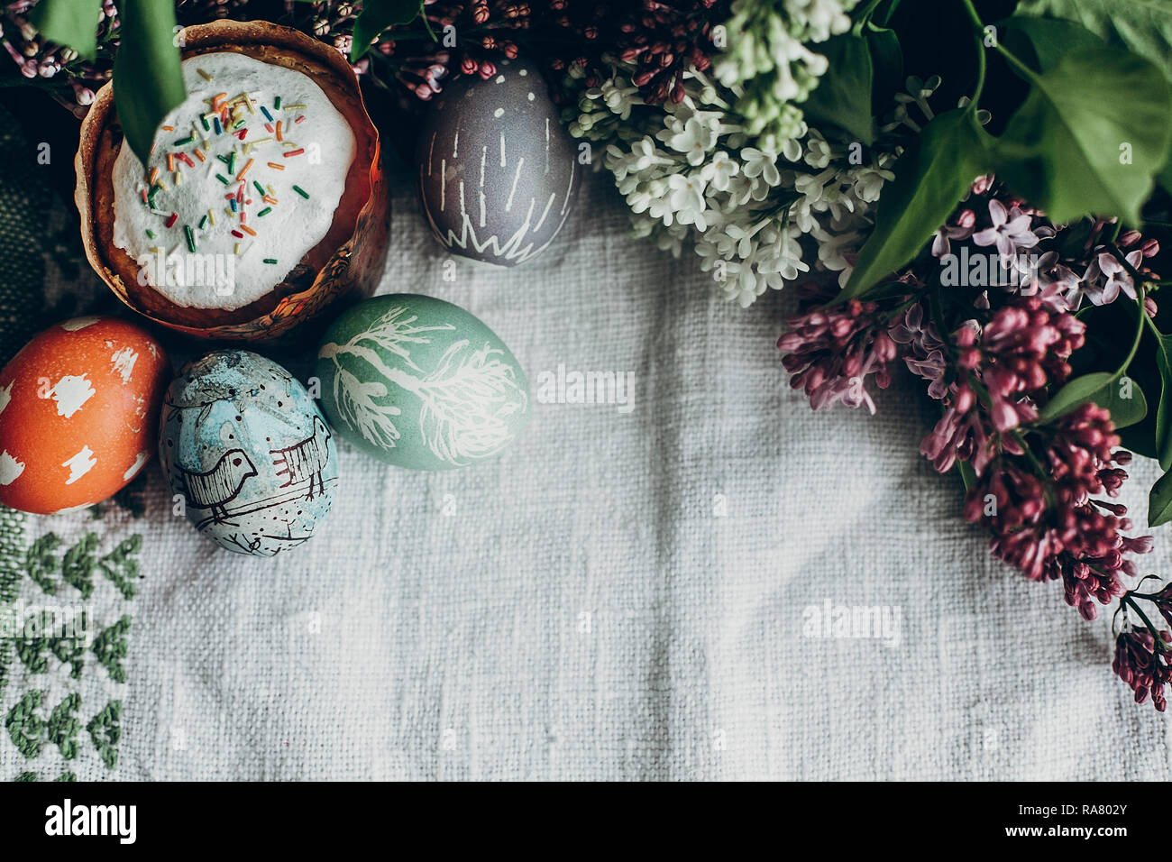 happy easter. easter cake and colorful decorated eggs on rustic ...