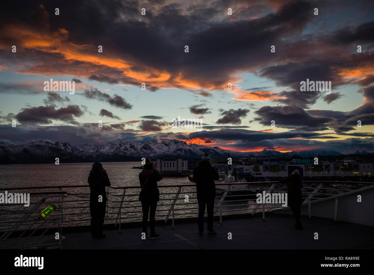 Photographers shooting the sunset on board the Hurtigruten coastal steamer, MS Polarlys, Norway. Stock Photo
