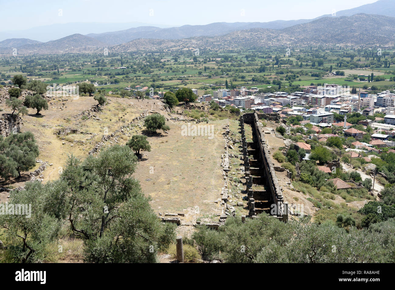 Elevated view of the Hellenistic market hall and the adjoining Agora, ancient city of Alinda, Caria, Anatolia, Turkey. The 90 metres long and 15 metre Stock Photo