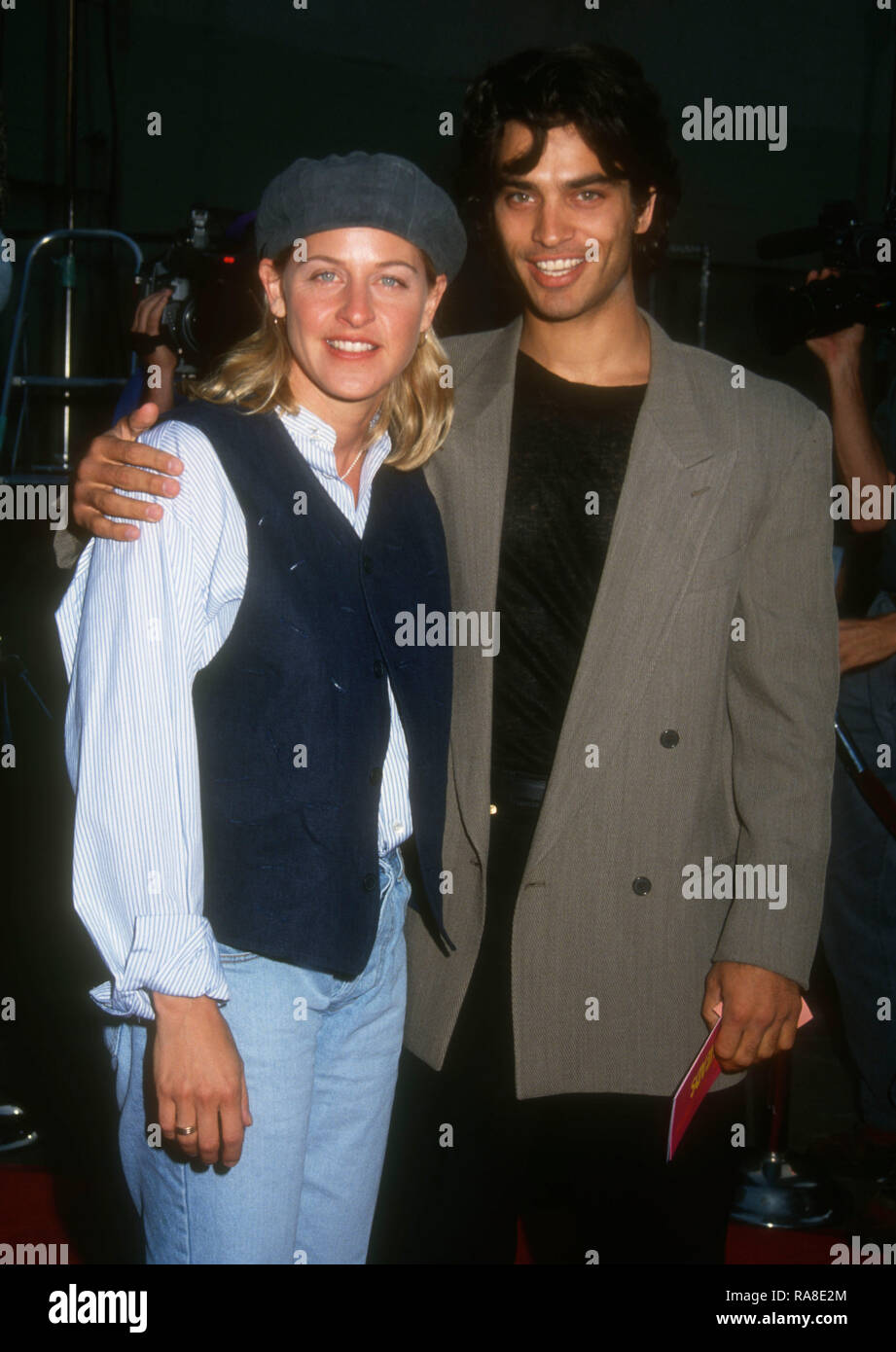 HOLLYWOOD, CA - JULY 19: Comedian/television personality Ellen DeGeneres and actor Johnathon Schaech attend Paramount Pictures' 'Coneheads' Premiere on July 19, 1993 at Mann Chinese Theatre in Hollywood, California. Photo by Barry King/Alamy Stock Photo Stock Photo
