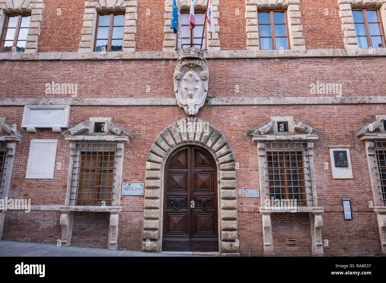 The seat of the Town Hall inside the well-preserved medieval urban structure of Colle di Val d'Elsa, Siena Stock Photo